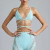 Topuri de bikini Liberty cu bretele încrucișate și ornamente, în culoarea albastru gheață Topuri de bikini Liberty cu bretele încrucișate și ornamente, în culoarea albastru gheață