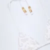 Topuri de bikini triunghiulare Comoros cu detalii decorative, în culoarea alb Topuri de bikini triunghiulare Comoros cu detalii decorative, în culoarea alb