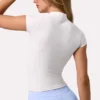 Topuri Soft Active cu fermoar pe un sfert în culoarea Milk Topuri Soft Active cu fermoar pe un sfert în culoarea Milk