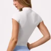 Topuri Soft Active cu fermoar pe un sfert în culoarea Milk Topuri Soft Active cu fermoar pe un sfert în culoarea Milk