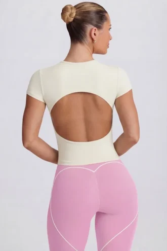 Tricou lung cu decupaje, culoare crem