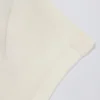 Tricou lung cu decupaje, culoare crem Tricou lung cu decupaje, culoare crem
