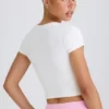 Tricou scurt din jersey de bumbac elastic cu imprimeu grafic, în alb Tricou scurt din jersey de bumbac elastic cu imprimeu grafic, în alb