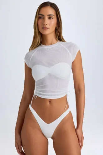 Tricou scurt, transparent, cu volane, model Santana, în culoarea alb