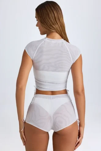Tricou scurt, transparent, cu volane, model Santana, în culoarea alb