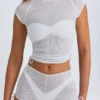 Tricou scurt, transparent, cu volane, model Santana, în culoarea alb