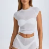 Tricou scurt, transparent, cu volane, model Santana, în culoarea alb
