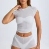 Tricou scurt, transparent, cu volane, model Santana, în culoarea alb
